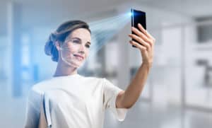 woman scanning her face with a phone