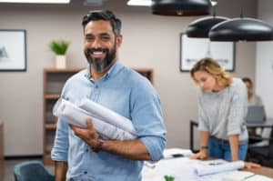 man standing in architecture office