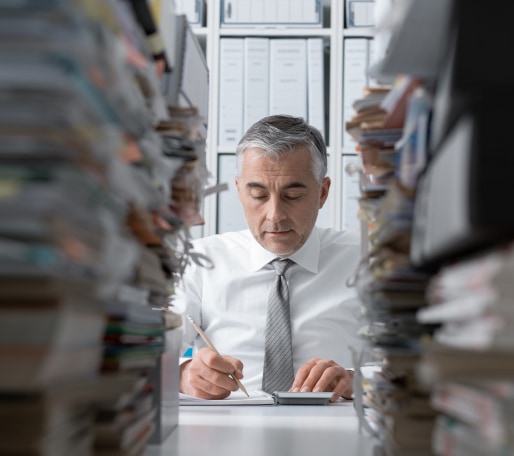man looking through paperwork